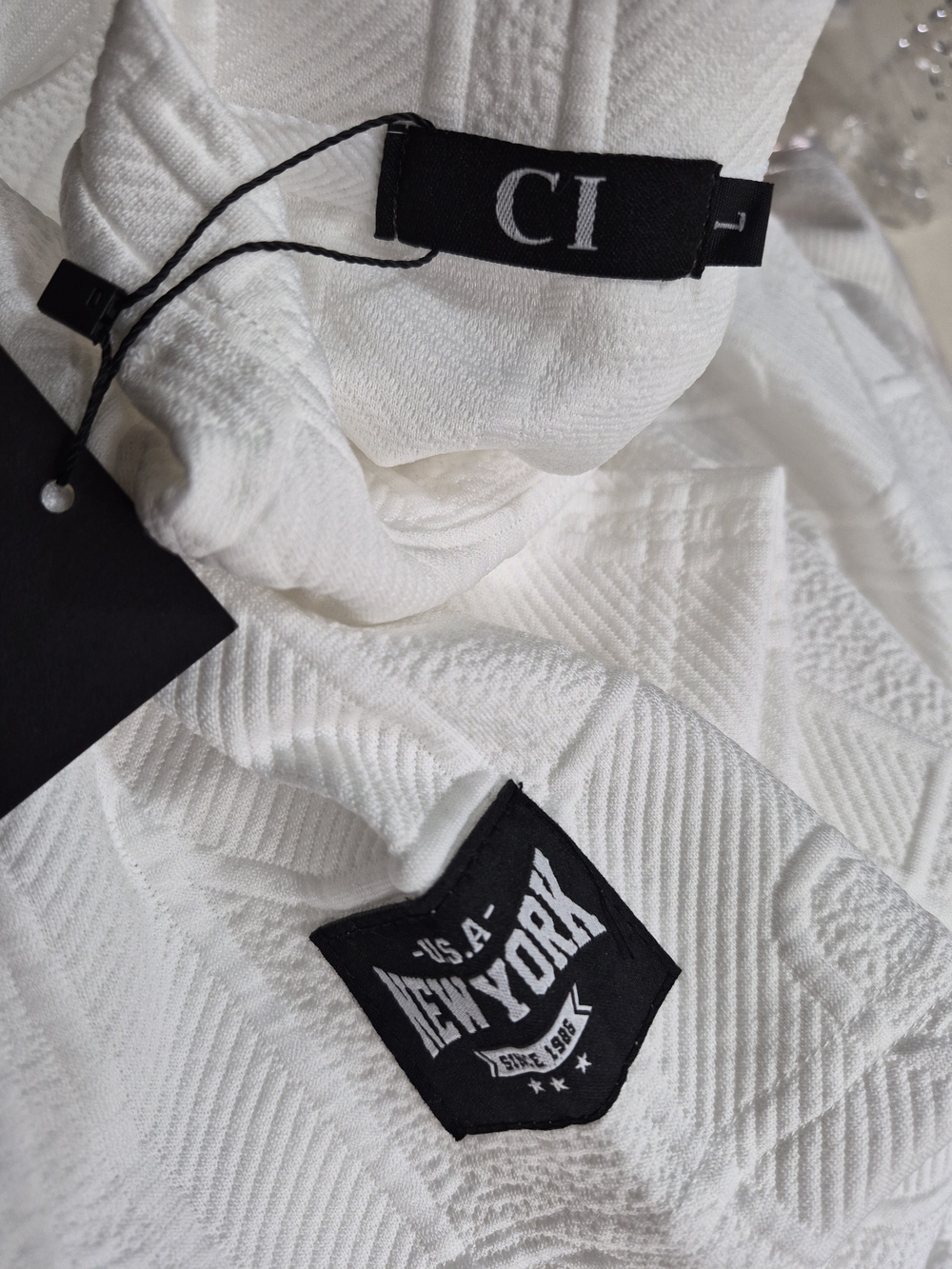 White Textured Men's Shirt with Branded Badge